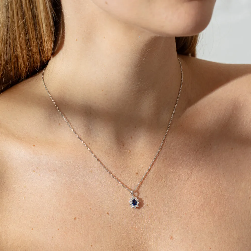 18ct White Gold .65ct Sapphire & Diamond Halo Pendant